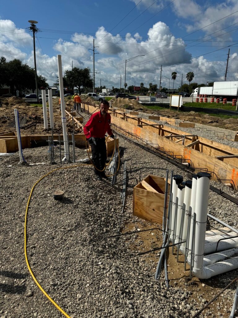 Haynes technician applying termite pre-treatment before a concrete slab is poured